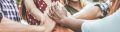 People-stacking-hands-AdobeStock 301125134-resized.jpeg