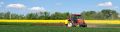 Tractor-sprinkling-pesticides-AdobeStock 541339660 copy RESIZED-CROPPED.jpg